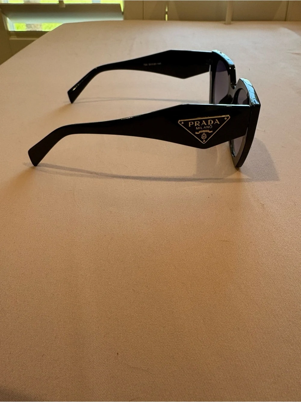 Prada Black Sunglasses with Purple Lenses
